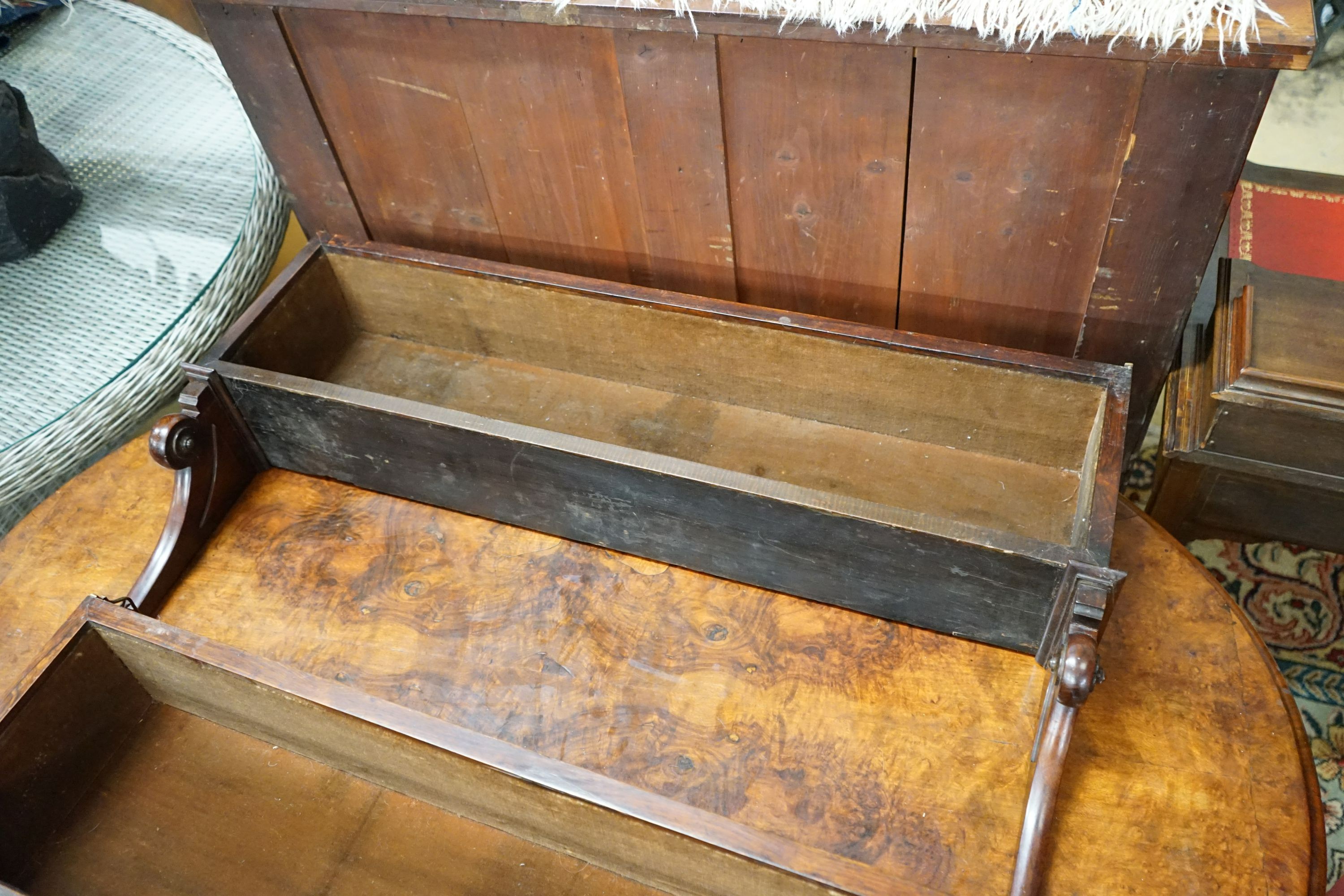 A pair of Victorian style rosewood wall brackets with brass galleried tops, width 94cm, depth 17cm, height 53cm